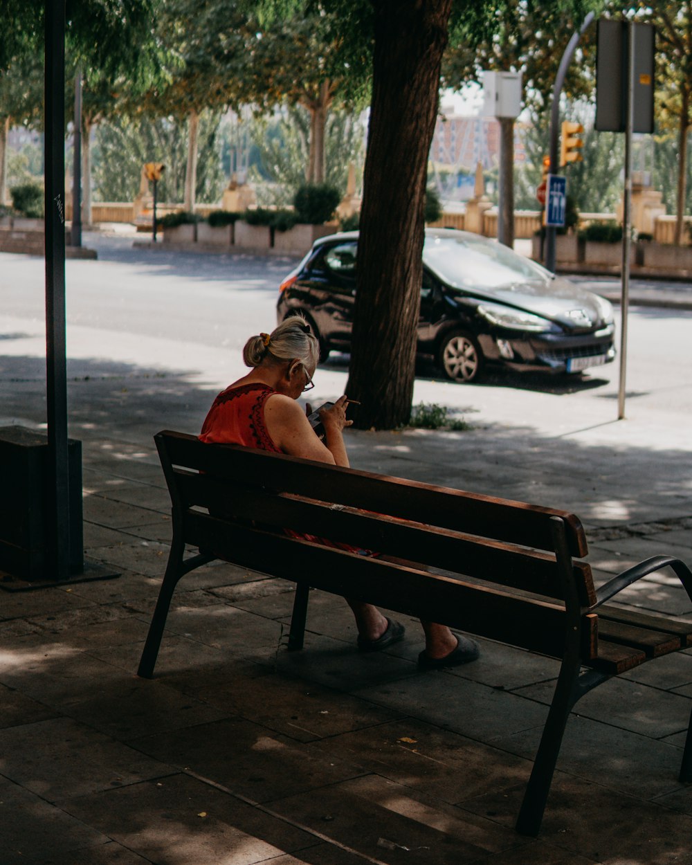 a person sitting on a bench