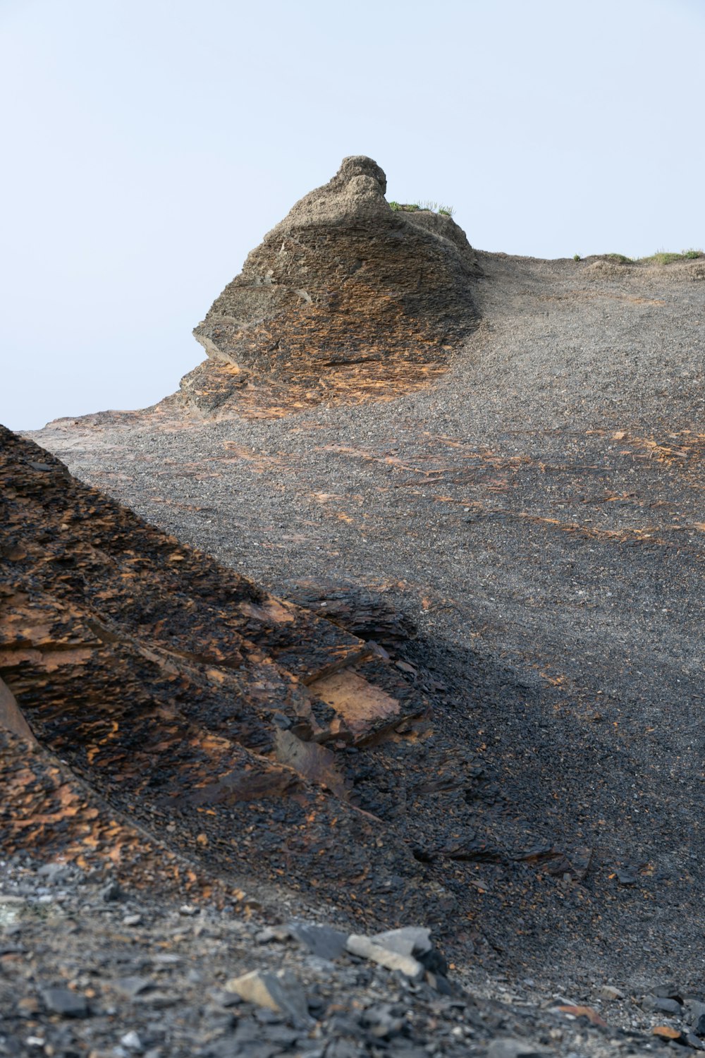 a large rock on a beach