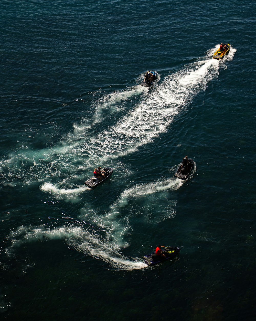 a group of people riding jets