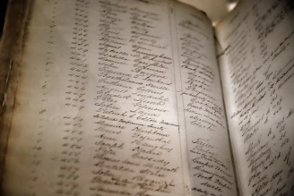 image of old log book of names