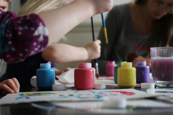 A family painting together. 