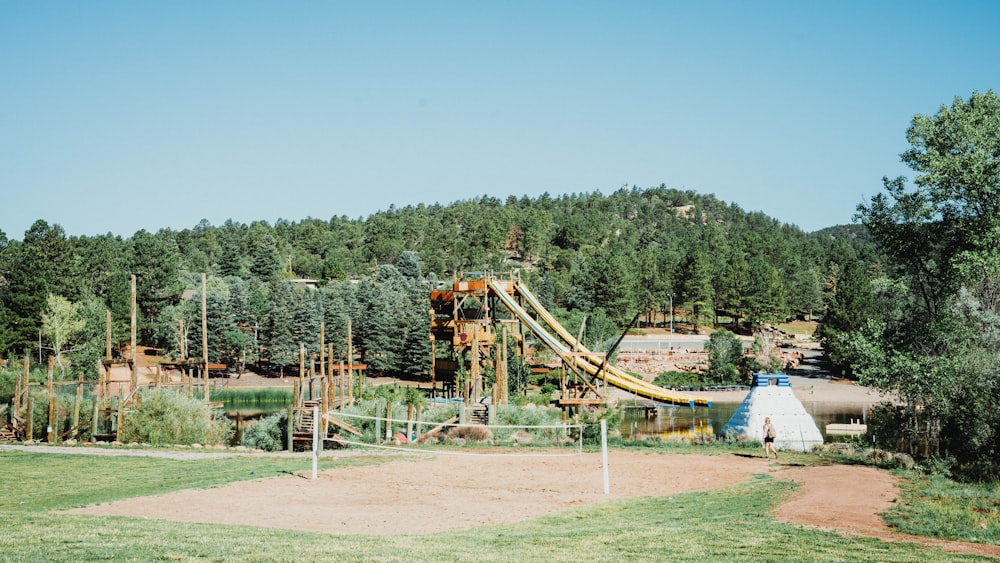 a playground with trees in the background