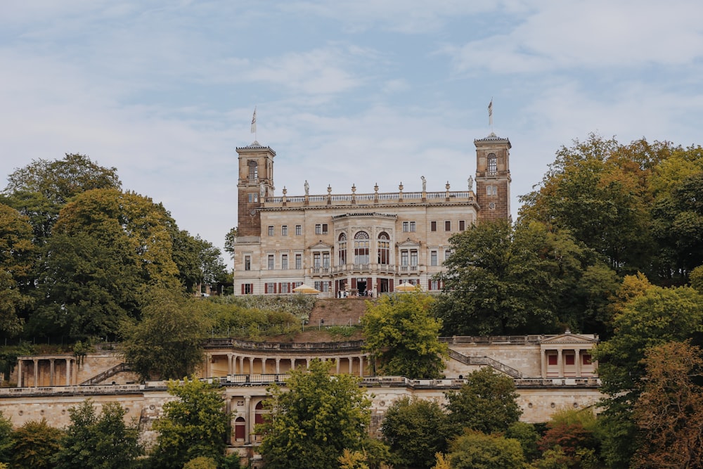 a large building with trees in front of it