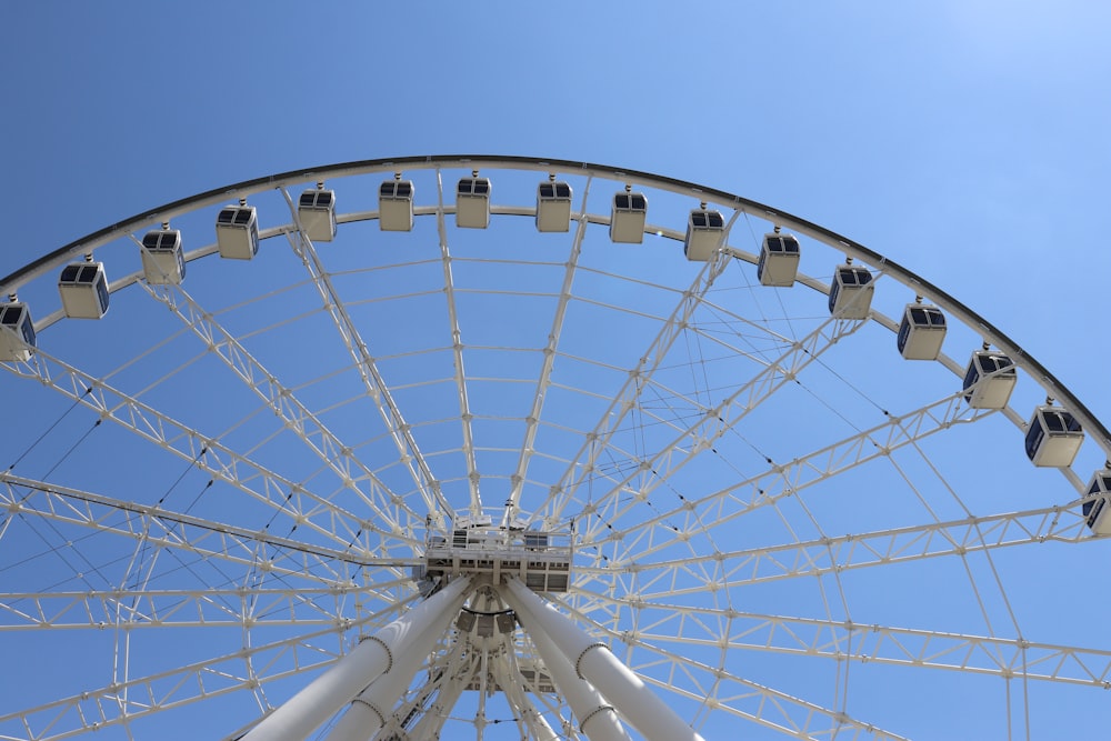 a ferris wheel with blue sky