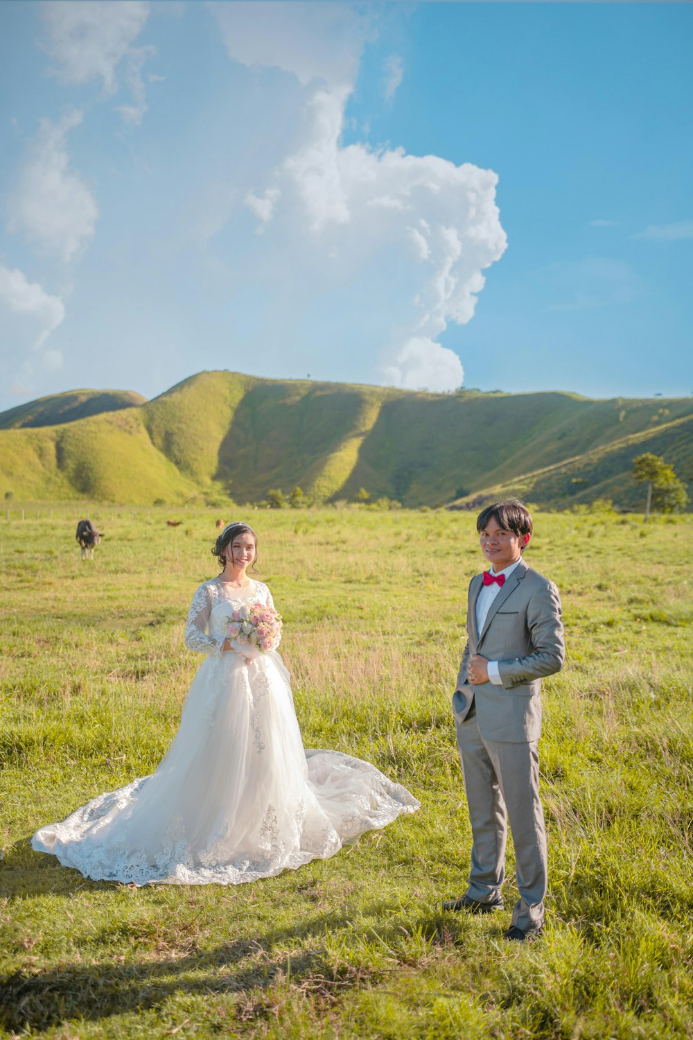 a man and woman in a field