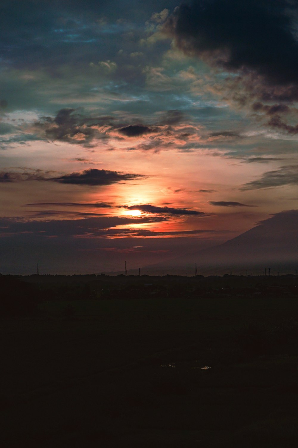 a sunset over a city