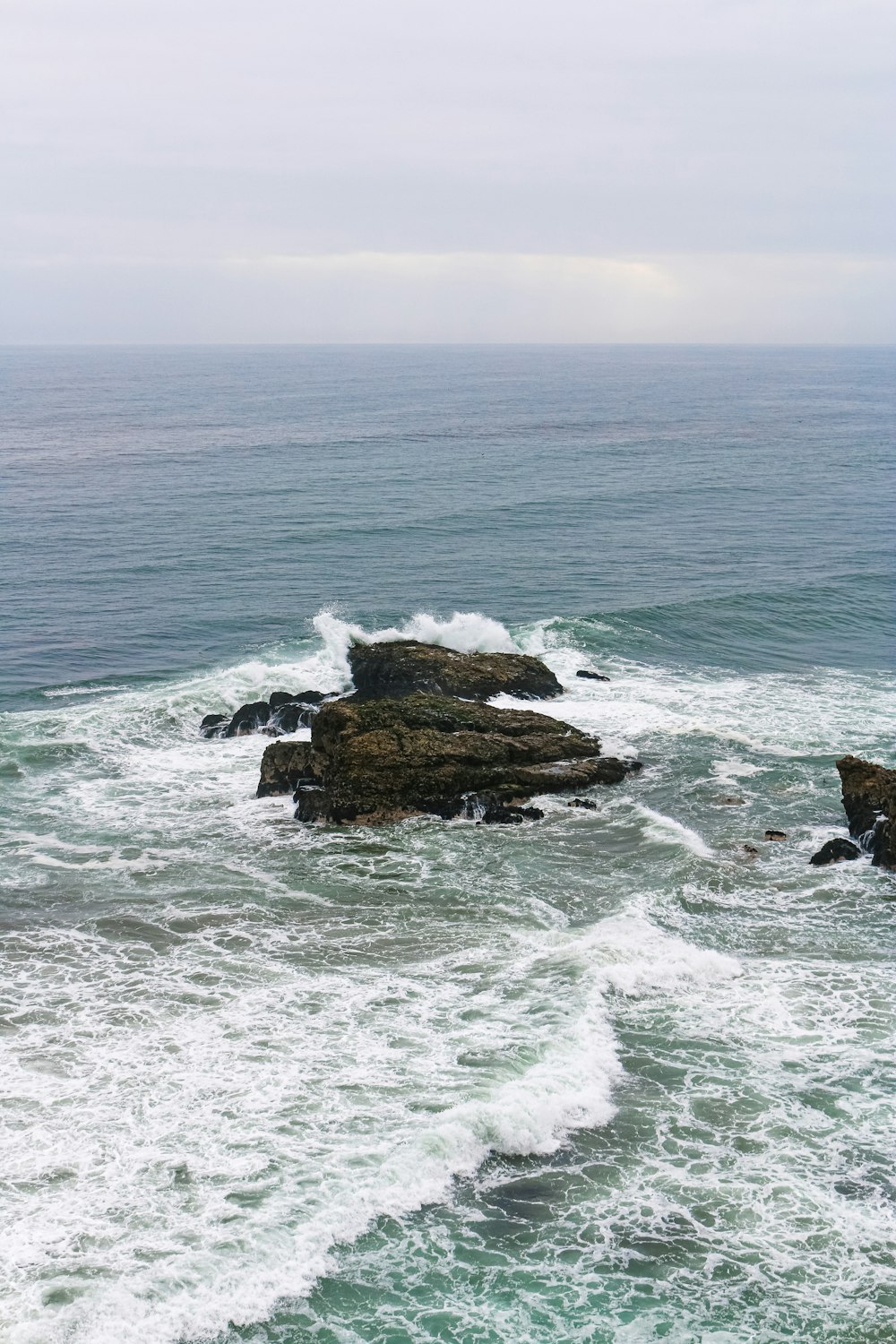 waves crashing on rocks