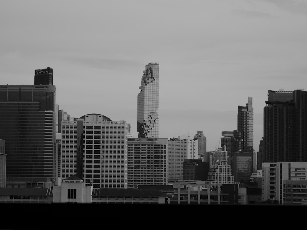 a city skyline with tall buildings