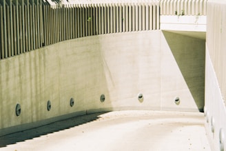 A precast cement boundary wall neatly installed around a factory perimeter.