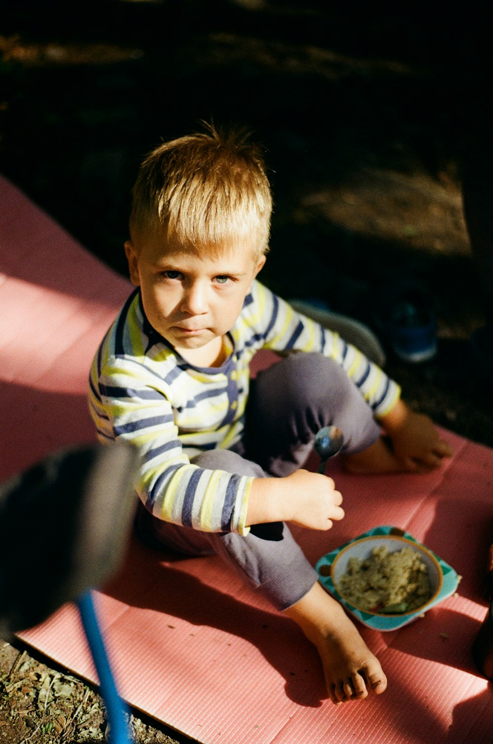 a boy sitting at a table