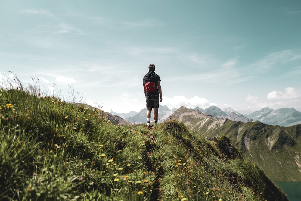 a man walking on a mountain