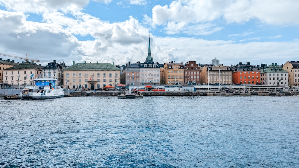 a body of water with buildings along it