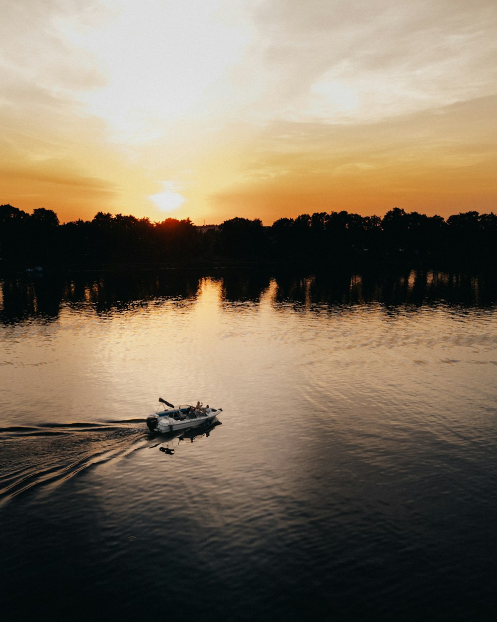 a couple of boats on a lake