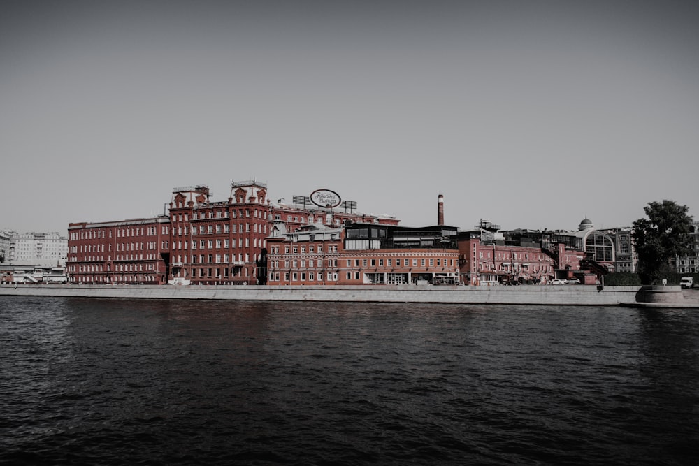 a large building next to a body of water