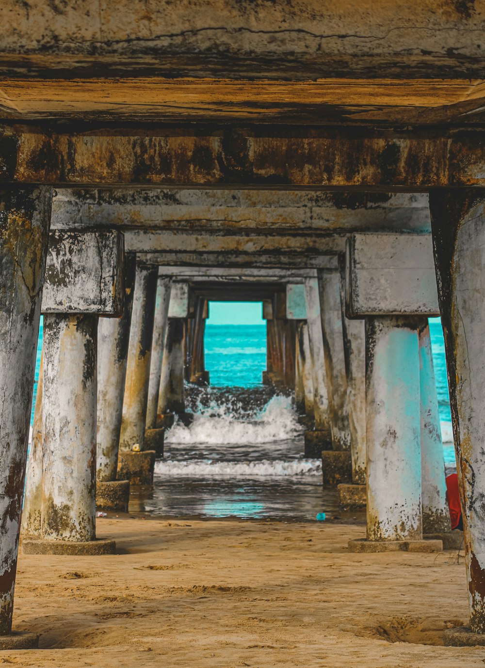 a water fountain in a stone building