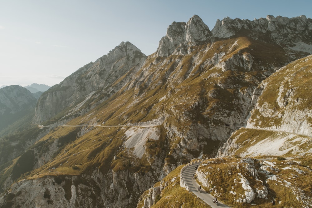 a road in a rocky mountain