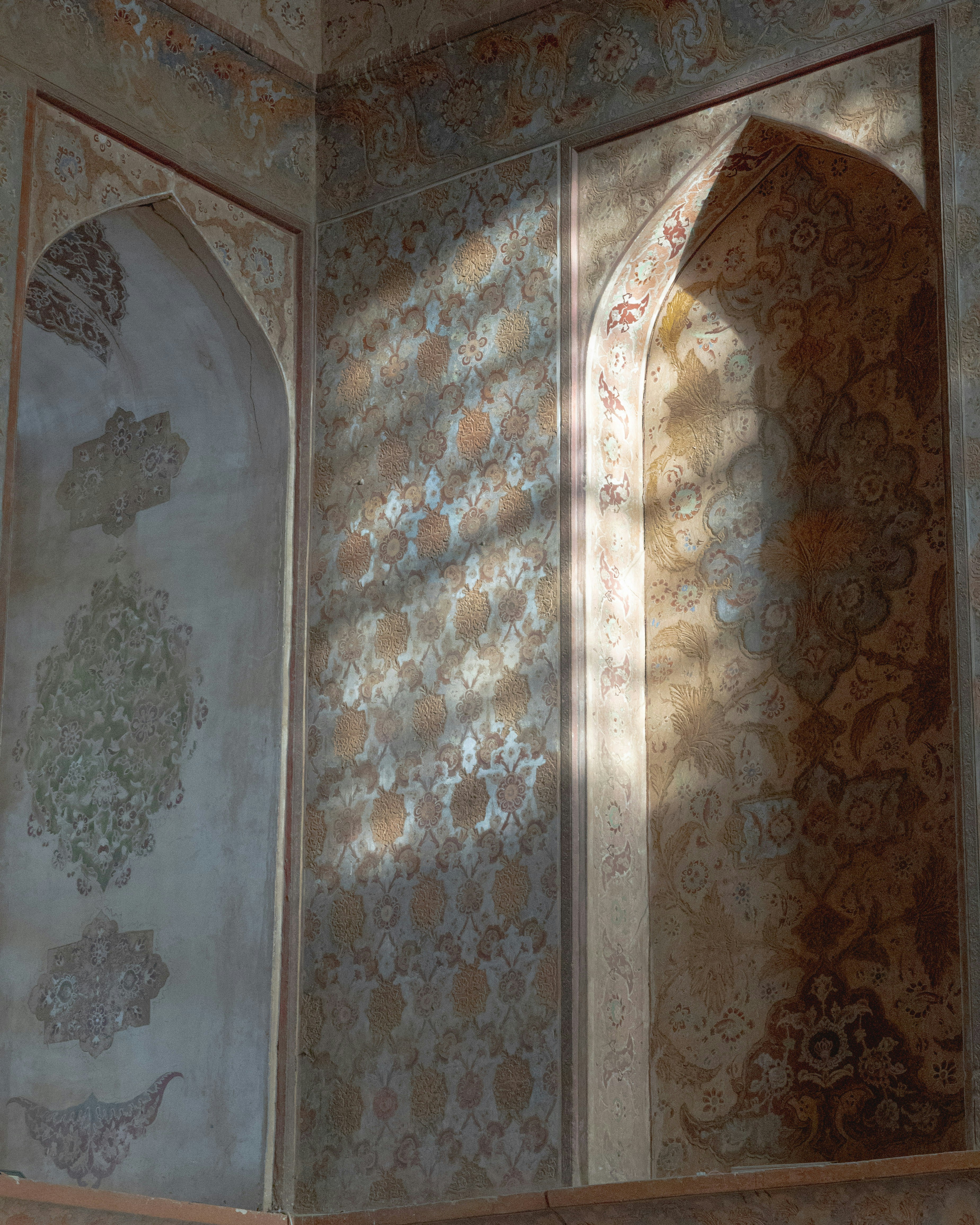 a wall with designs on it