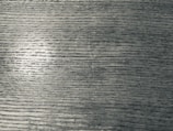 Overhead angle of a detailed wood grain pattern on a tabletop
