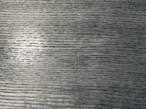 Overhead angle of a detailed wood grain pattern on a tabletop