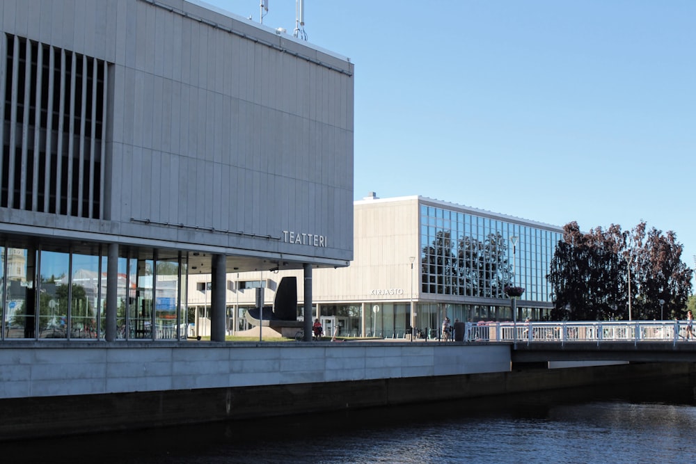 a building with a bridge over water