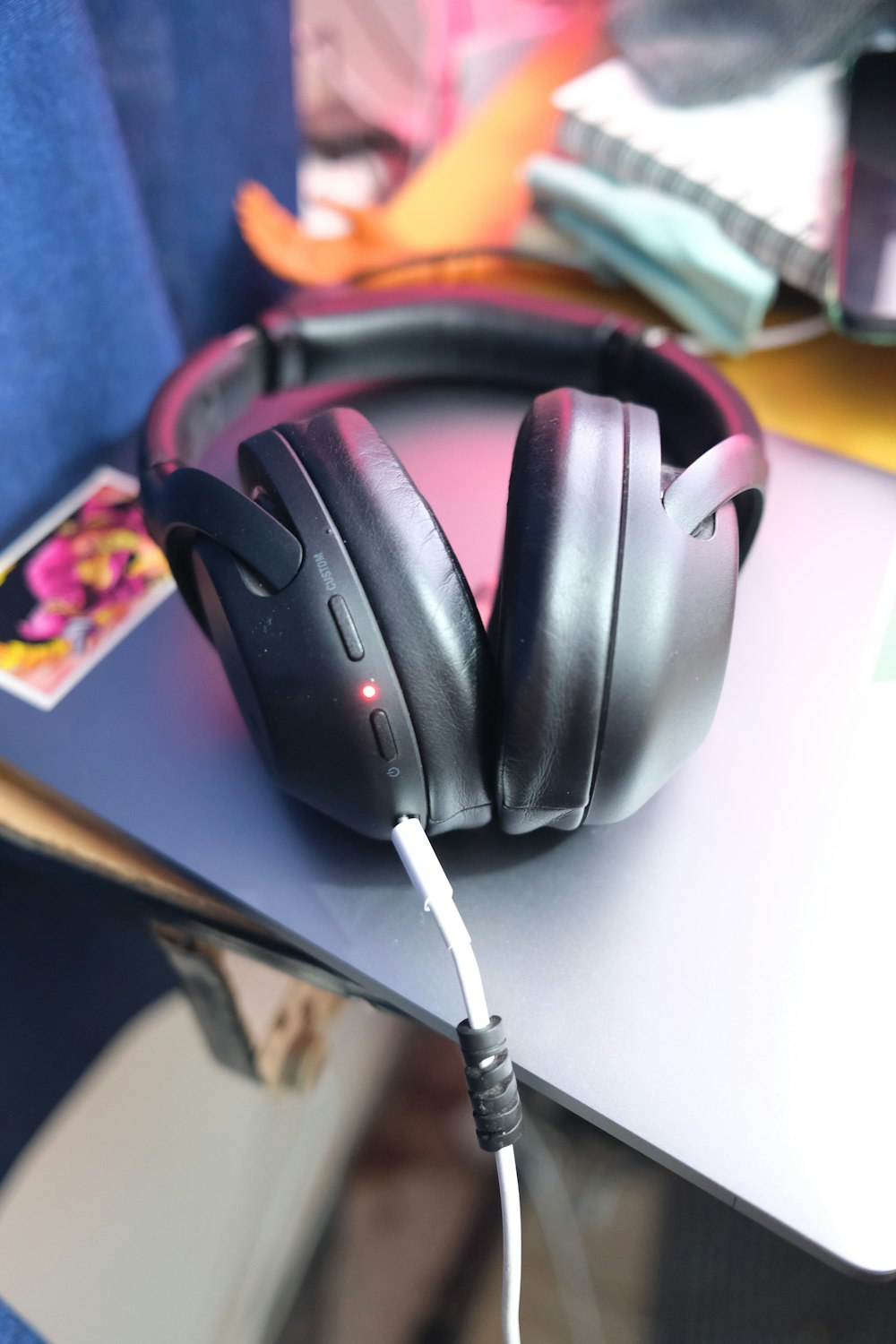 a pair of headphones on a desk