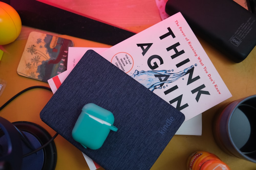 a book and a cup on a table