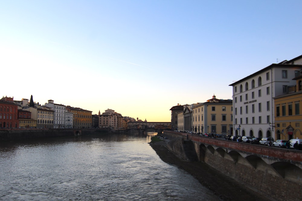 a river with buildings along it