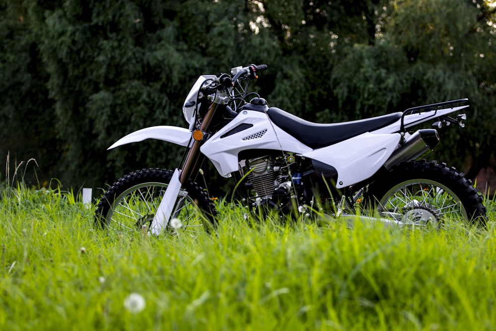 a motorcycle parked in a grassy area