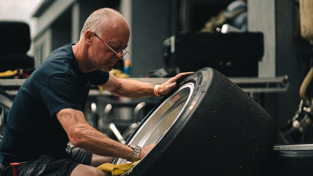 a man working on a car