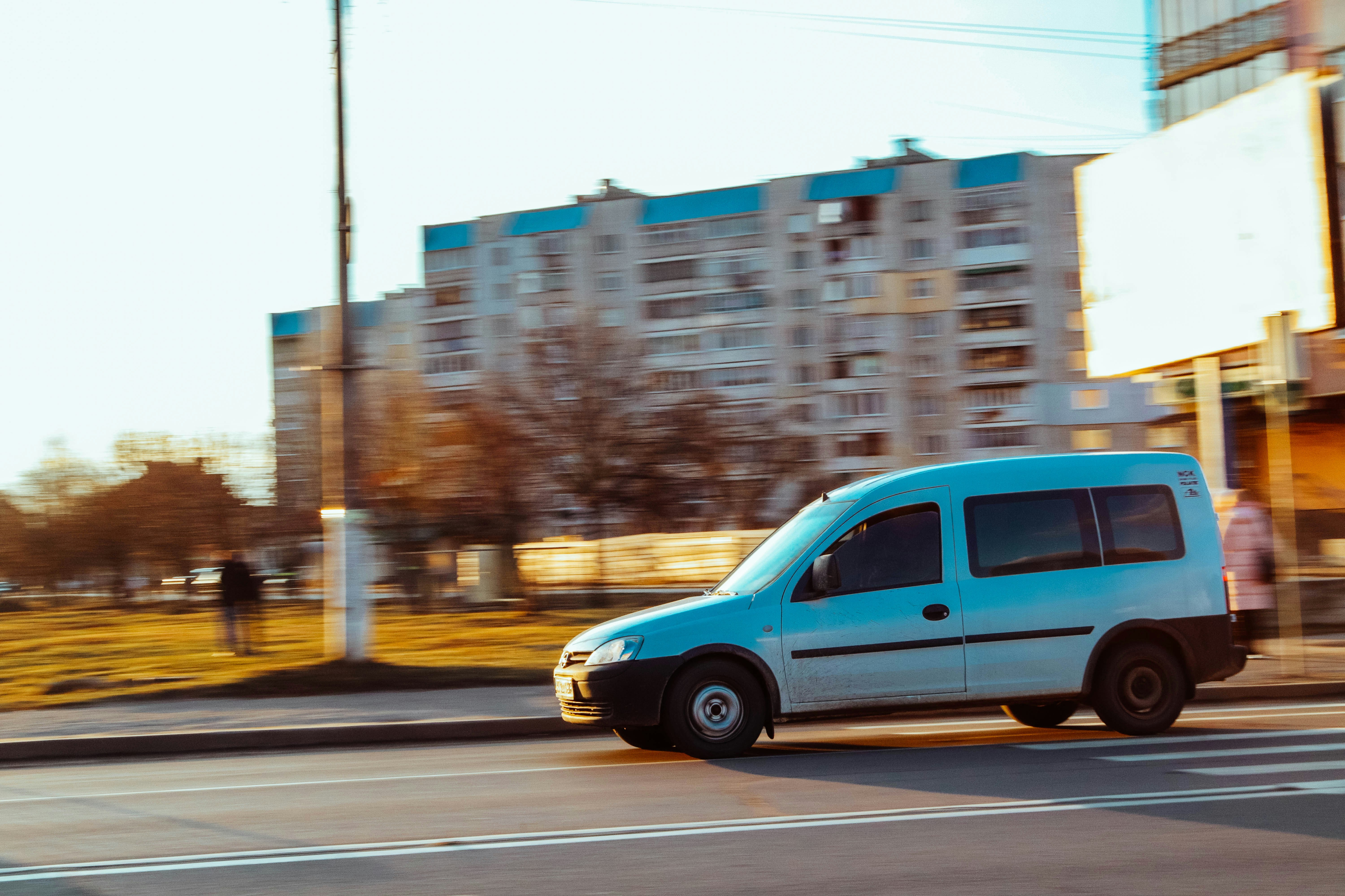 a van driving down a street