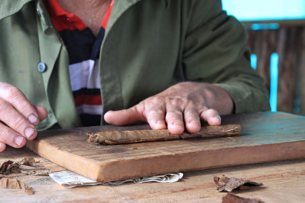 a person holding a snake