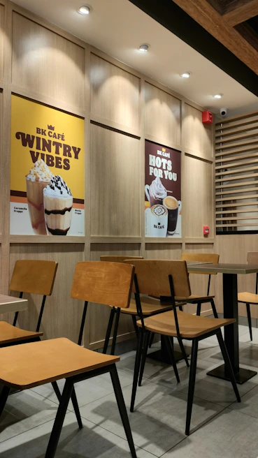 A sleek social media post layout for a small café, featuring mouth-watering coffee and cozy ambiance.