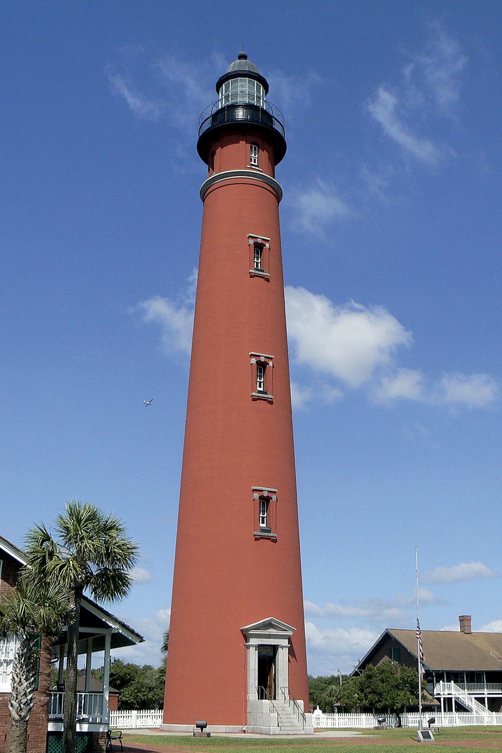 a lighthouse with a blue sky