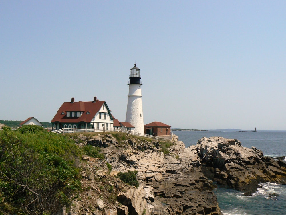 a lighthouse on a rocky shore