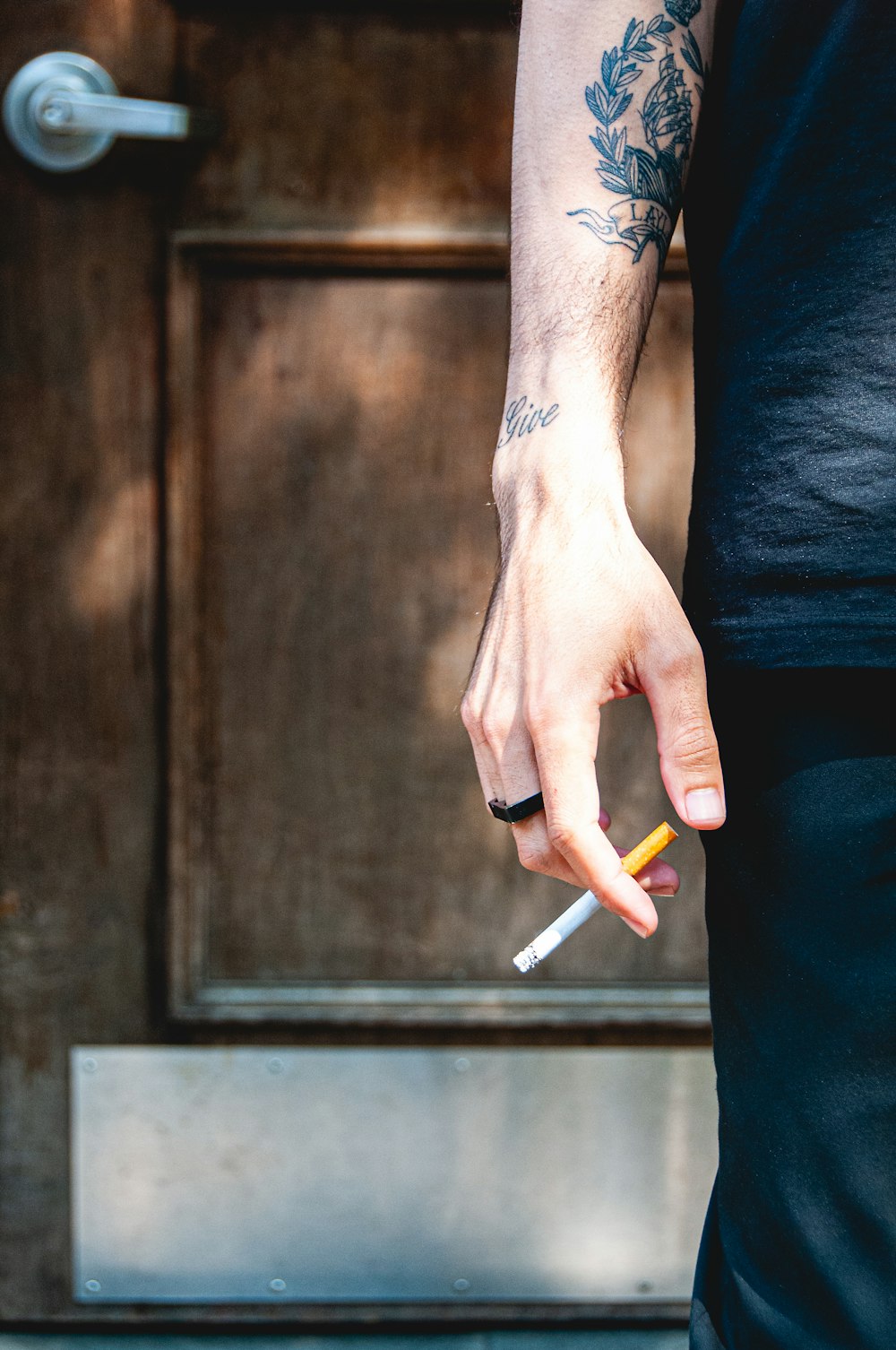 a man holding a pencil