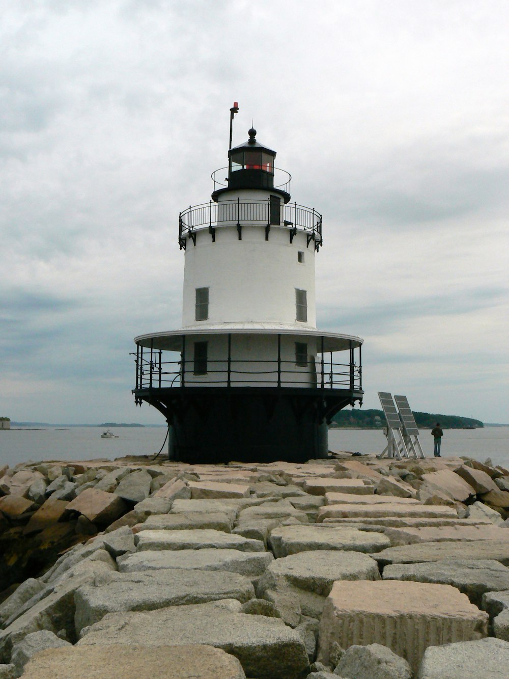 a lighthouse on a rocky shore