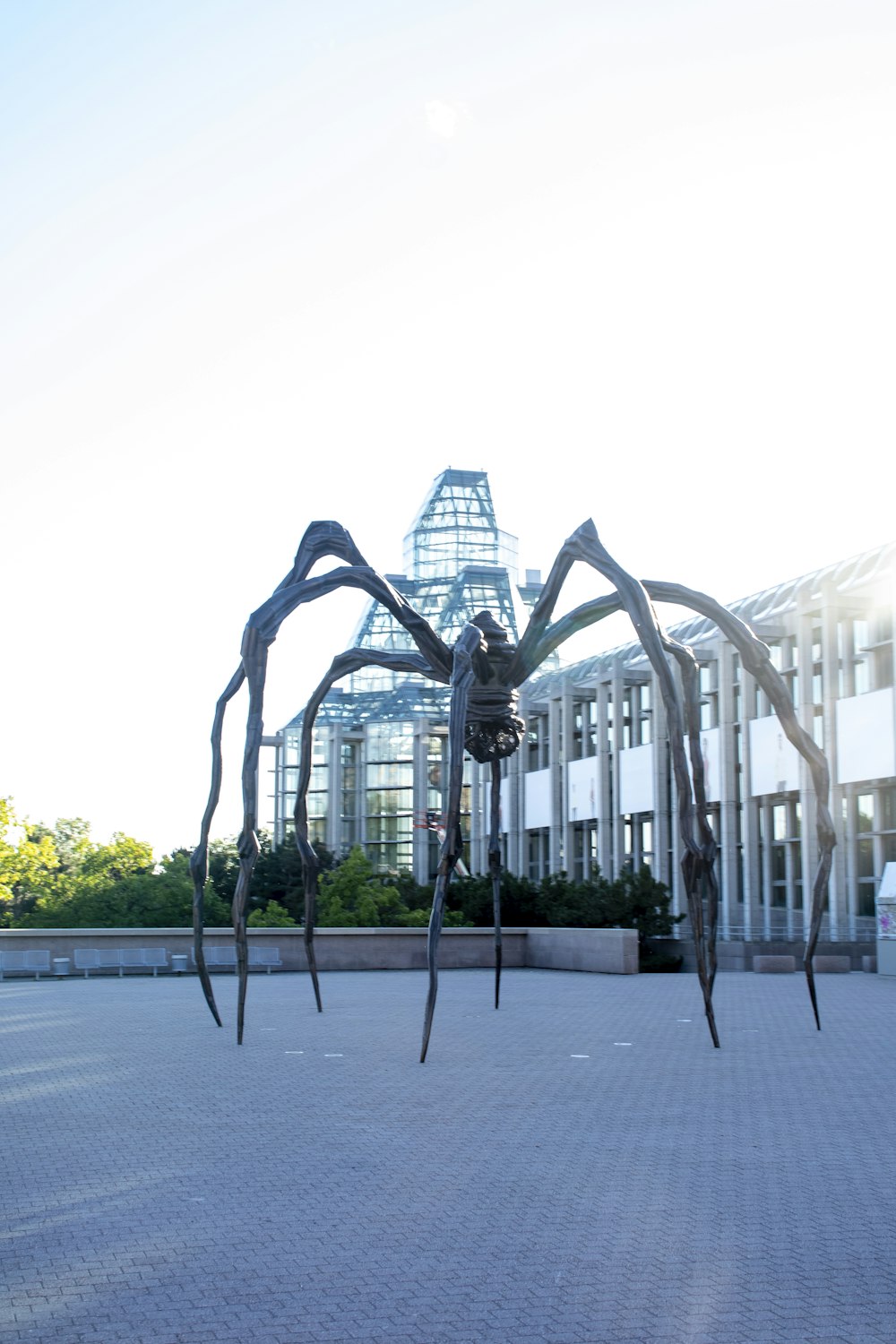 a sculpture in front of a building