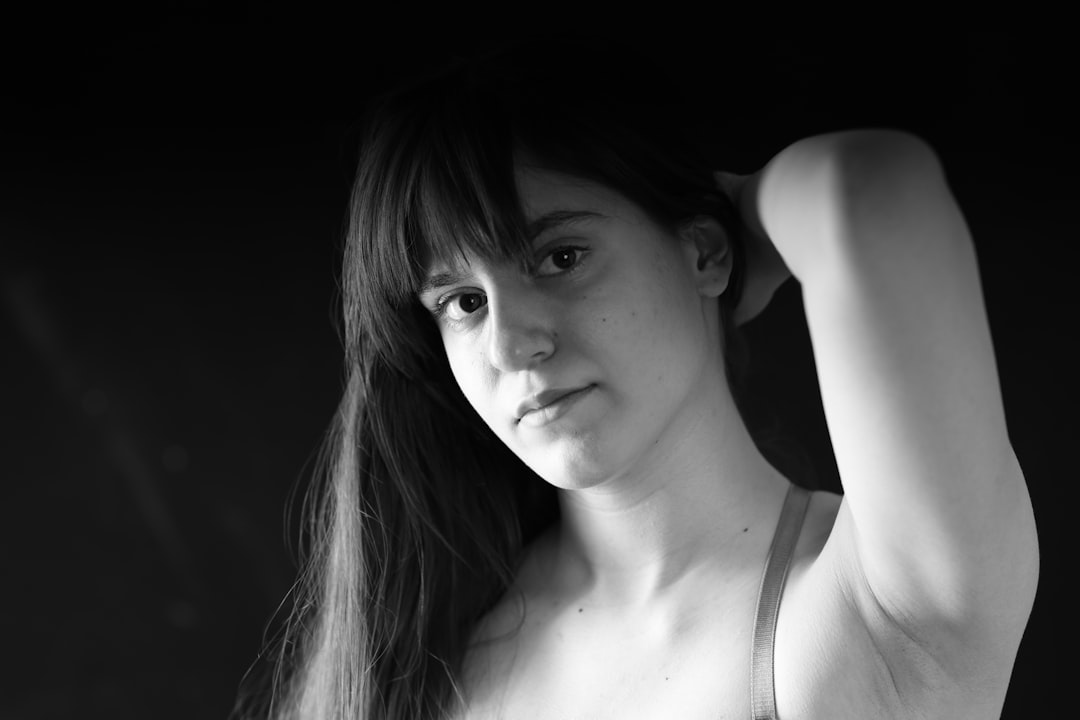 a woman with long hair,