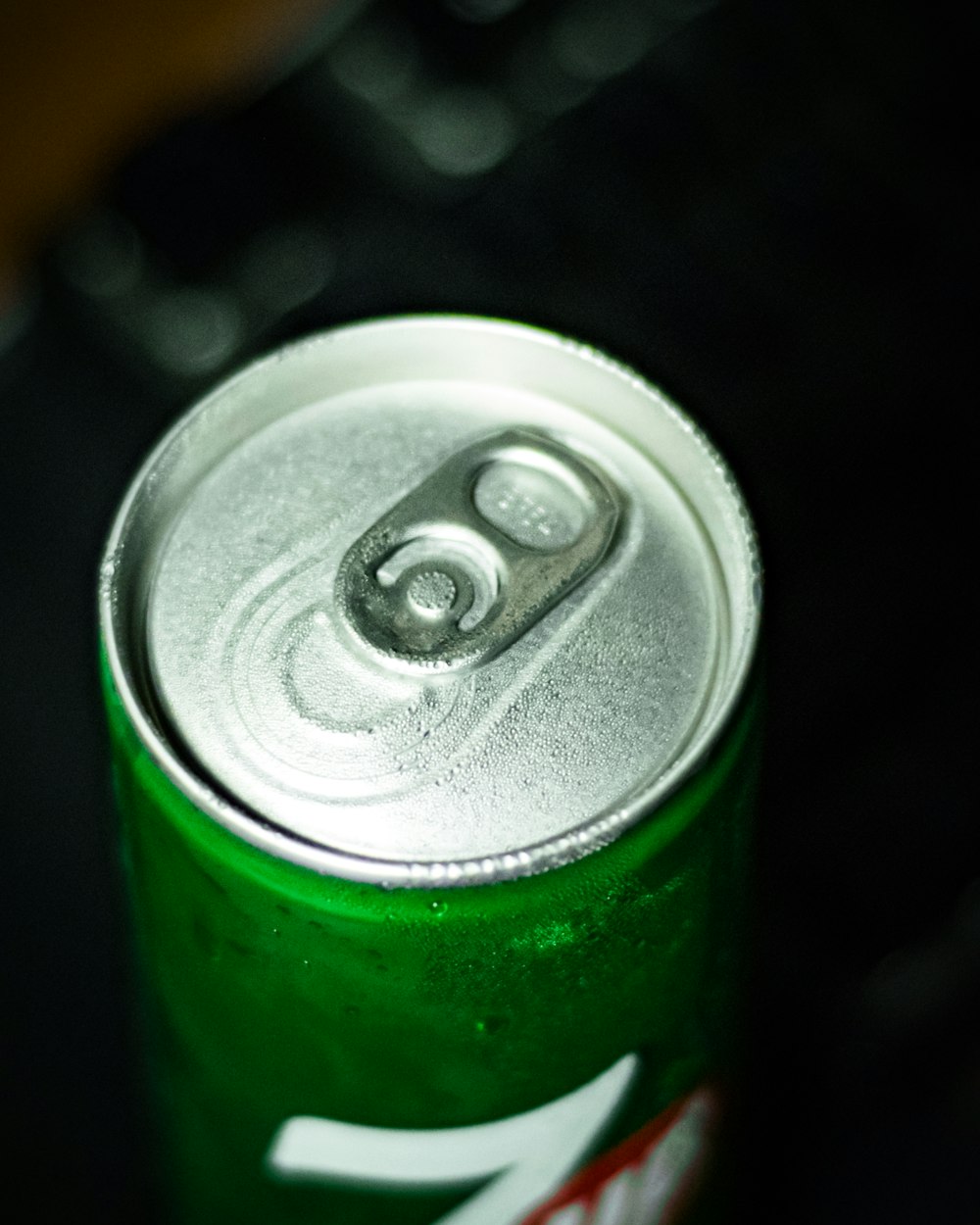 a green can with a white label
