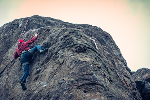 a person climbing a mountain