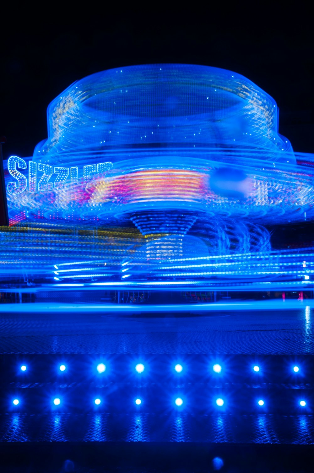 a large blue and white sphere with lights