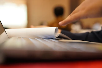 a close-up of a person reading a book