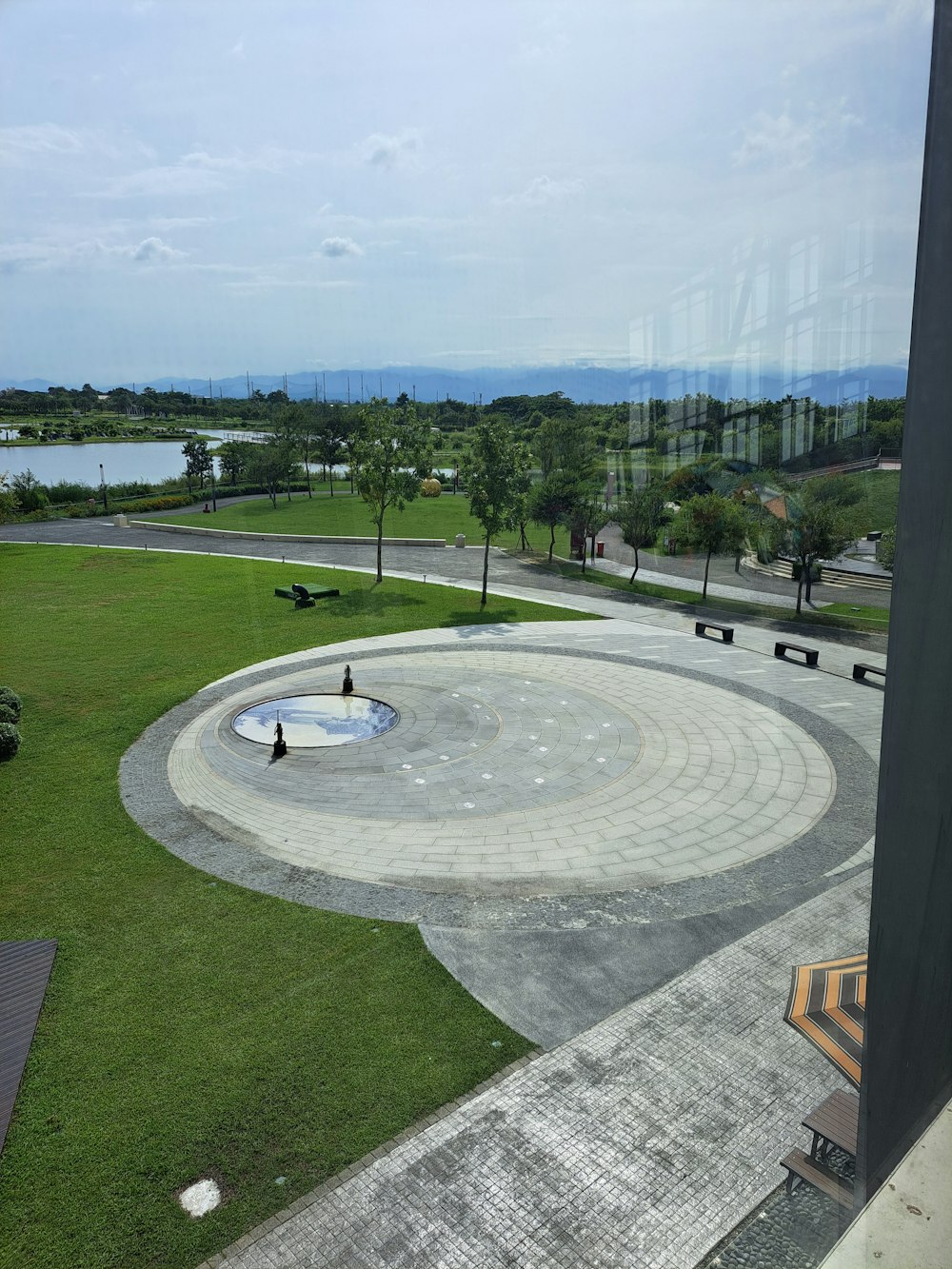 a large circular area with a pond in it