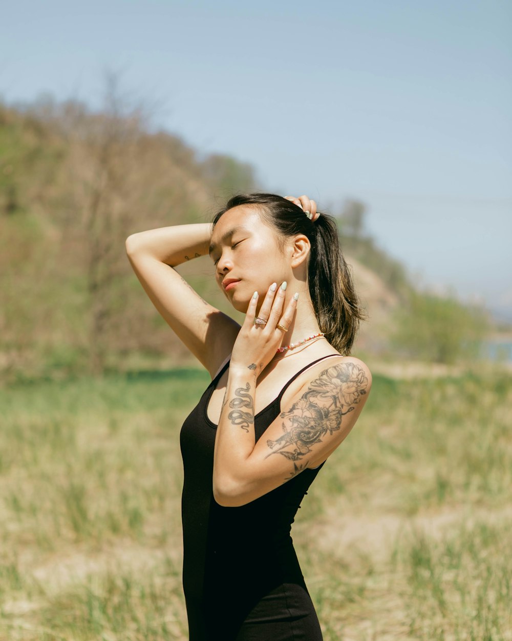 a woman with her hands on her face