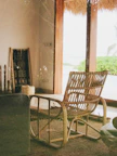 Cozy interior of the seaview bungalow with wooden furniture and natural light.