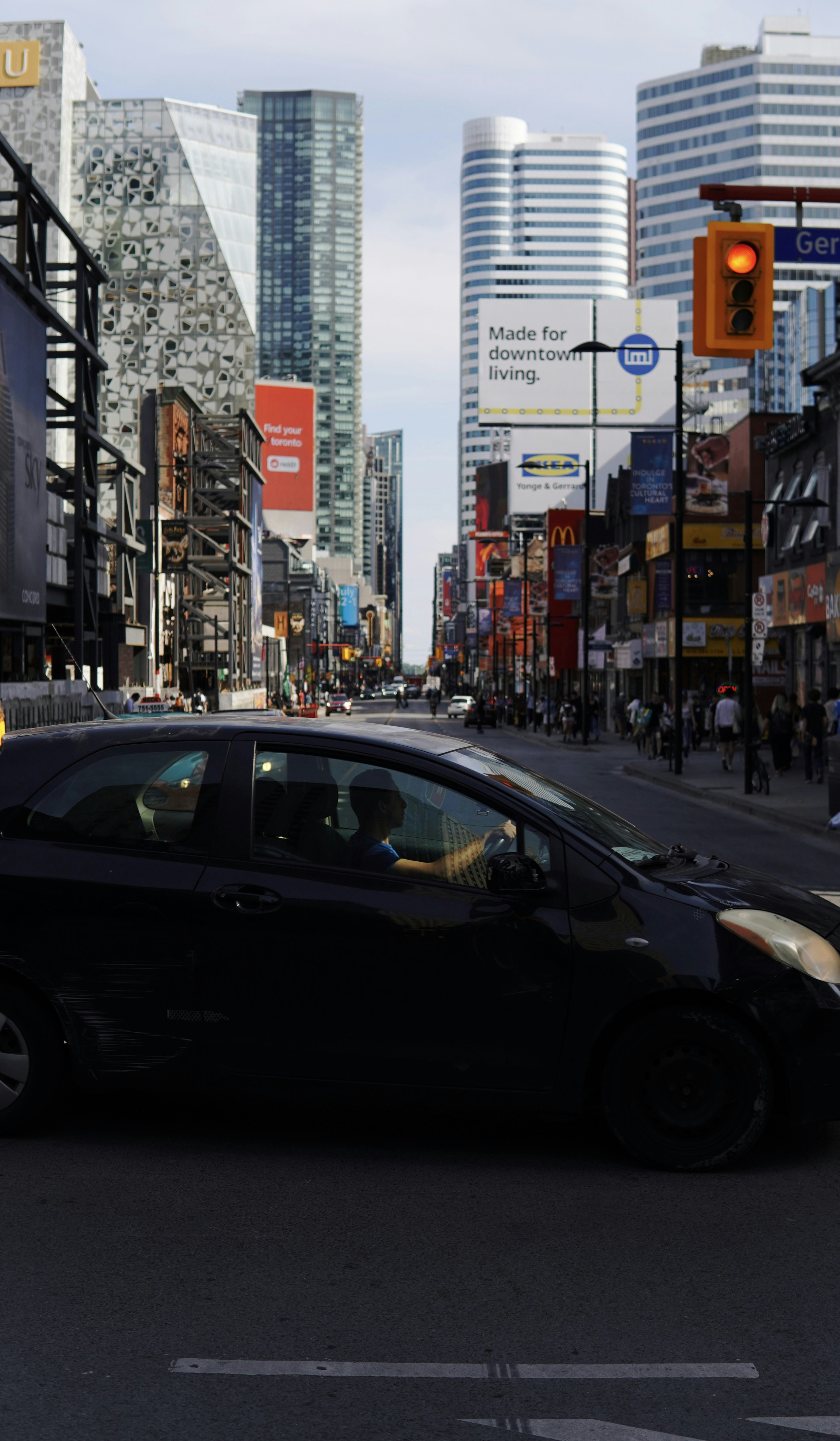 a car driving through a city