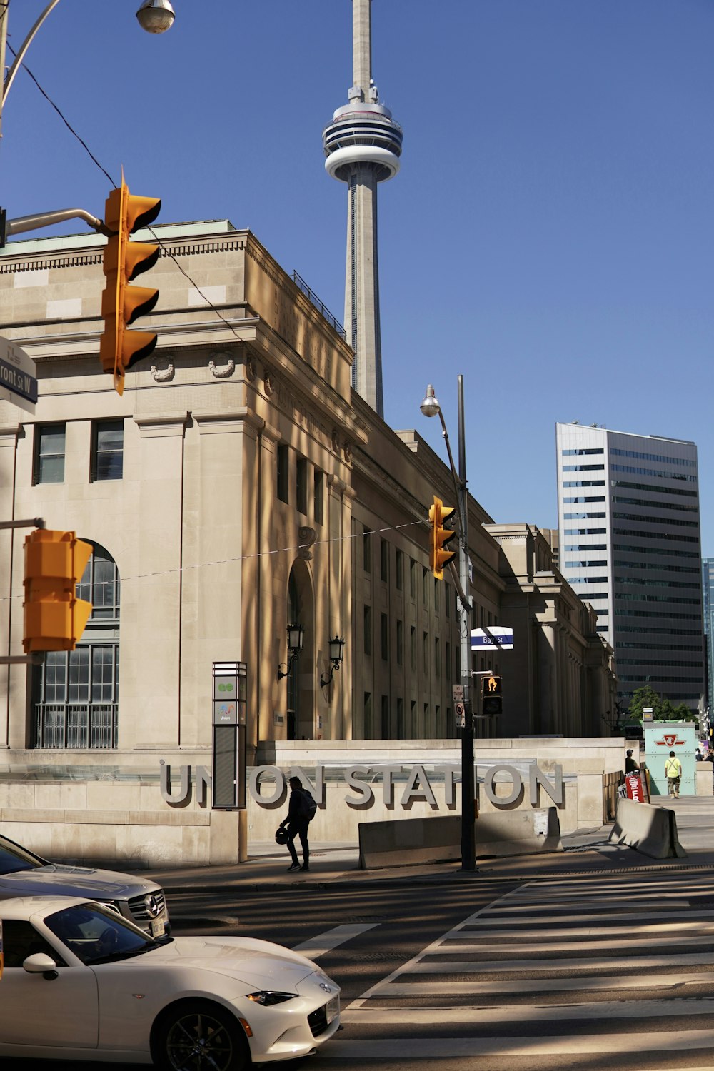 a large building with a tower in the background