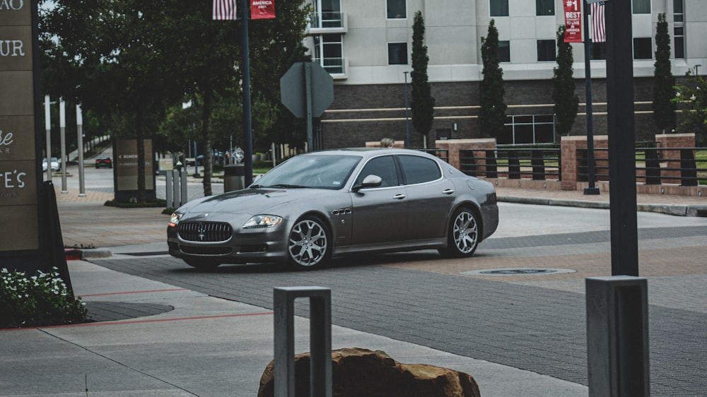 a silver car parked on a street