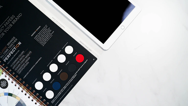 The Xtool O1 Omni surrounded by printed samples showcasing its versatility in material types.