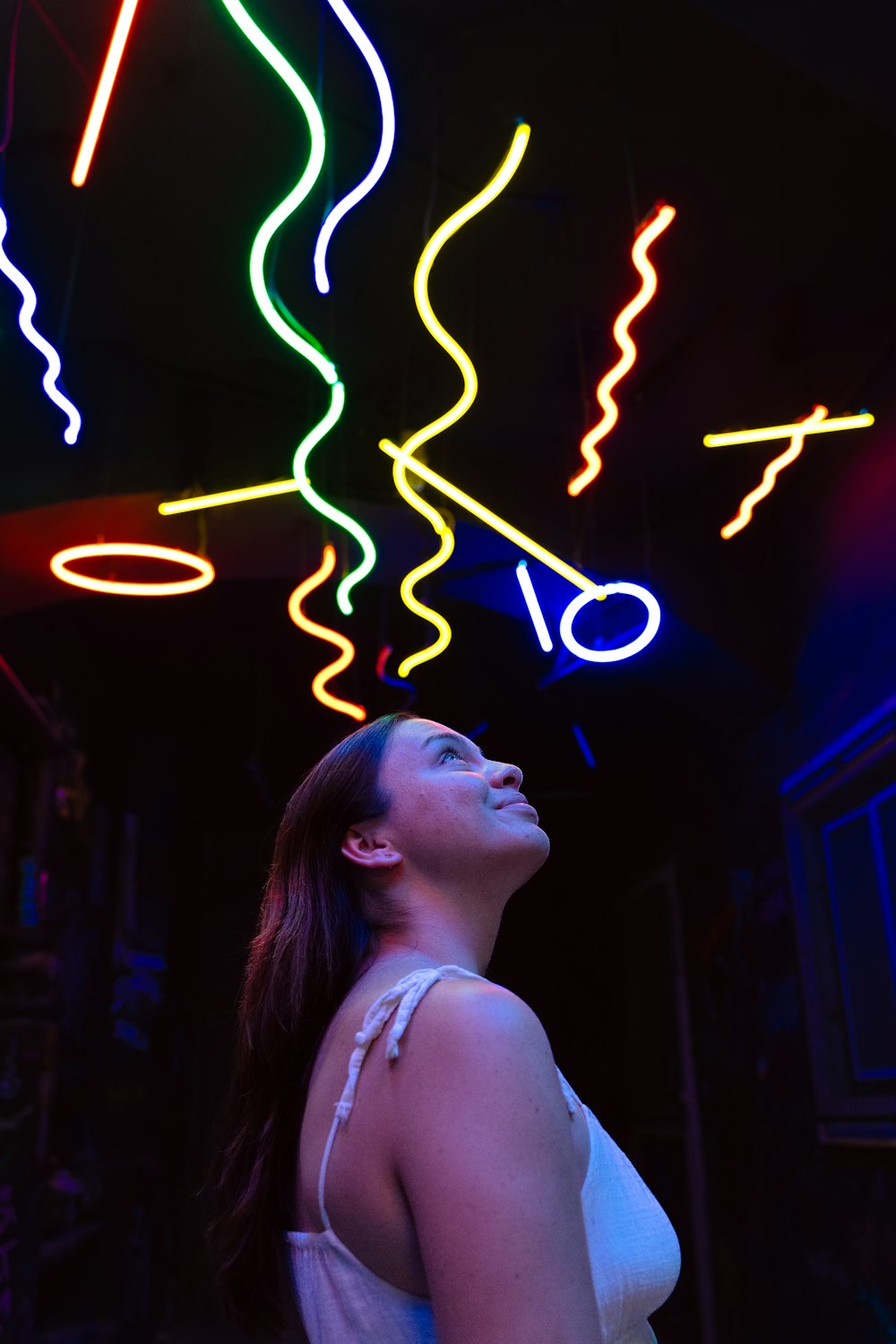 a woman standing in front of a stage